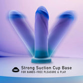 Three Avant Midnight Rendezvous - Ocean Blue Realistic Dildos, featuring a strong suction cup base, are artfully displayed against a soft, colorful background. The text at the bottom reads, "G-spot precision and hands-free pleasure with a powerful suction cup base.